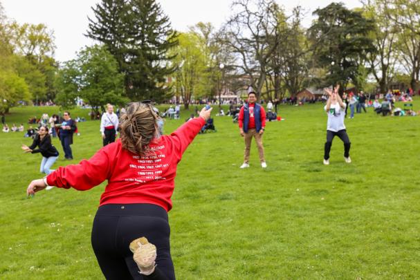 Attendees participate in the egg toss on Cook Douglass during Rutgers Day