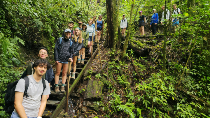 Study abroad student Hannah Storch hiking with her group in a rainforest in Costa Rica.