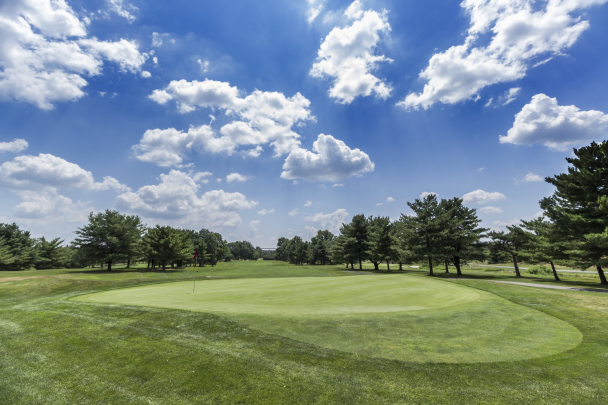 Rutgers University Golf Course with blue sky and puffy clouds
