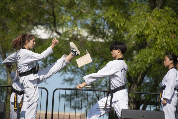 Members of The Rutgers Taekwondo Club perform at the Involvement Fair. 