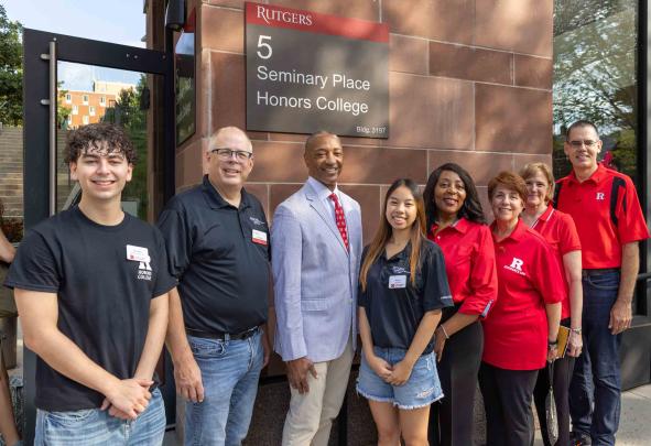 On hand during move-in day were: Jerry Deblois (left), an Honors College lead community mentor; Honors College Dean J.D. Bowers; Rutgers President William F. Tate IV; Alina Chen, an Honors College lead ambassador; Rutgers-New Brunswick Chancellor Francine Conway; Francesca Maresca, Interim Vice Chancellor for the Student Experience; Carolyn Moehling, Senior Vice Provost and Vice Chancellor for Undergraduate Education; and Charles Keeton, Vice Provost for Experiential Learning.